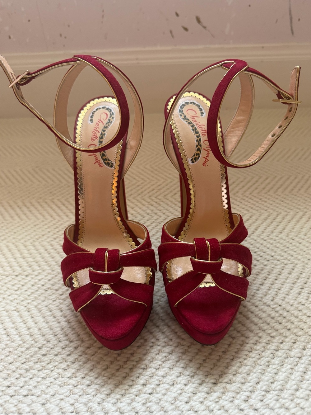 Charlotte Olympia Red Velvet Knotted Ankle-Strap Heels with Gold Trim